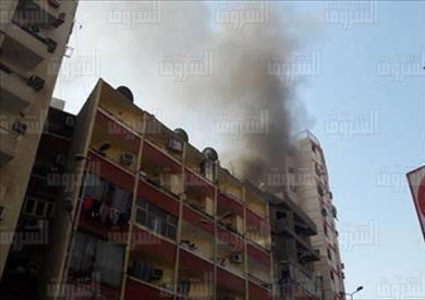 سيارات الاطفاء تحاول السيطرة علي حريق مخبز اسيوط -تصوير يونس درويش